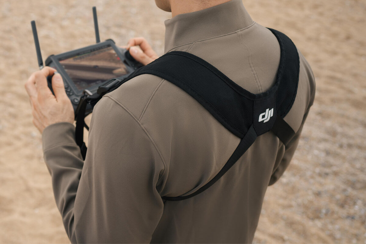 DJI RC Plus 2 strap and waist support kit with adjustable straps and padding, designed for comfortable drone controller carrying.
