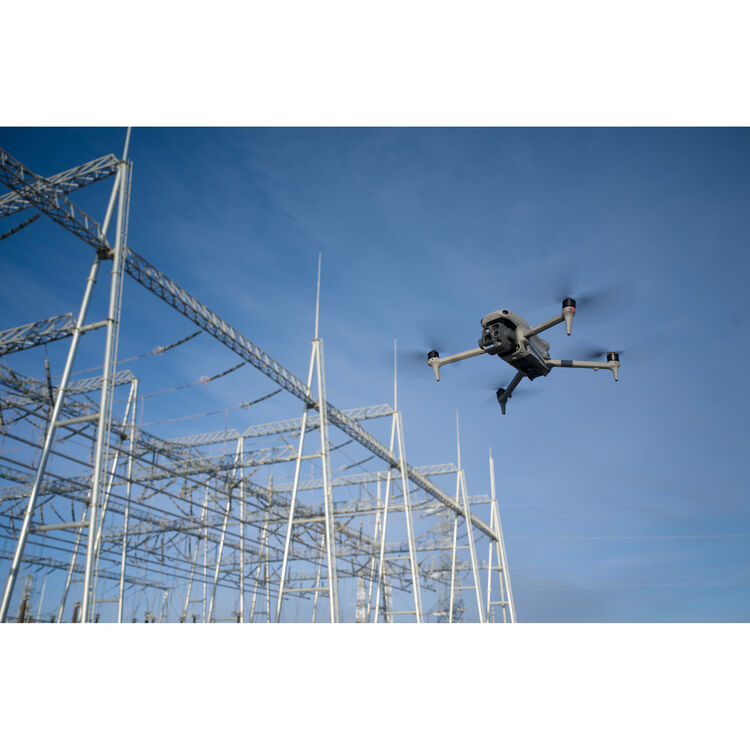 DJI Matrice 4T drone with DJI Care Enterprise Plus, shown with camera and industrial payloads in a professional setting.