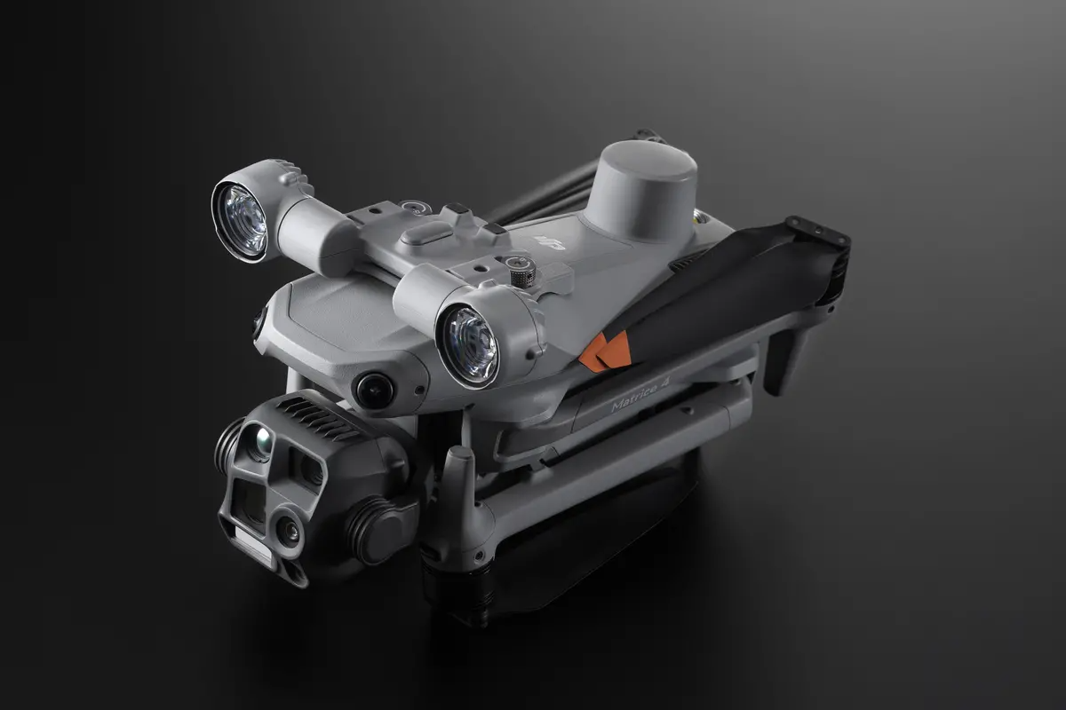 DJI AL1 Spotlight for Matrice 4 Series drone, EE GROUP branded, showing the compact LED spotlight attachment in a detailed view.